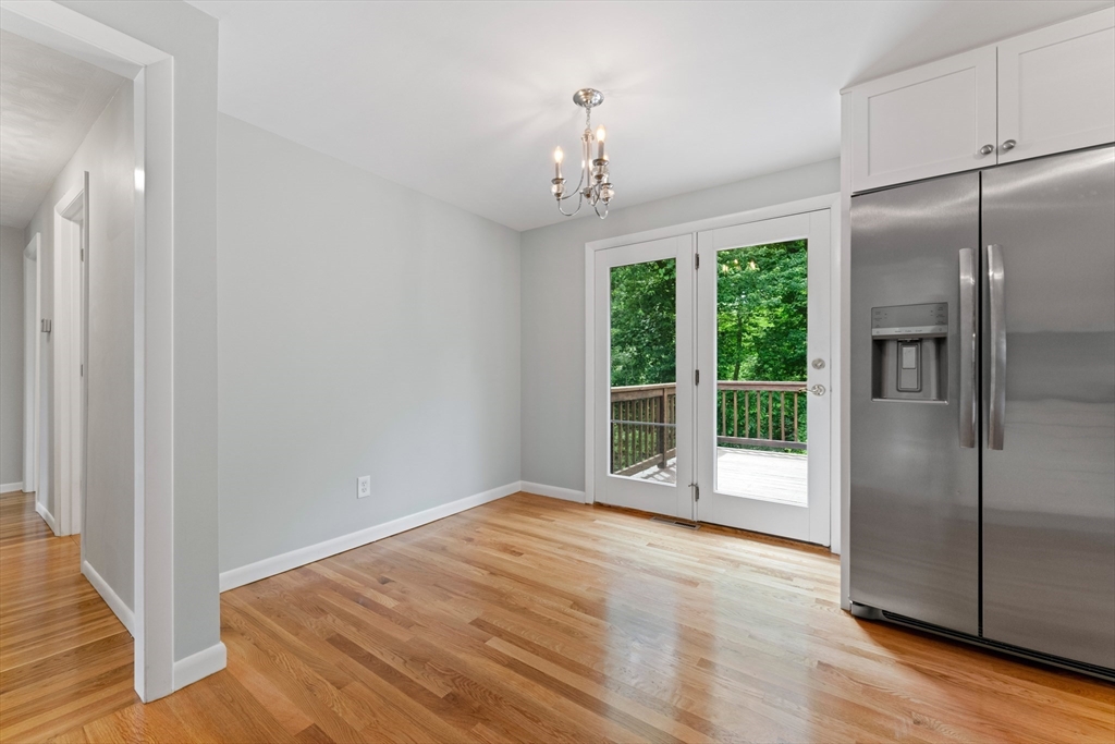 50 Farm Street Bellingham, MA 02019 - Photo 4 of 16 a view of an empty room with a window