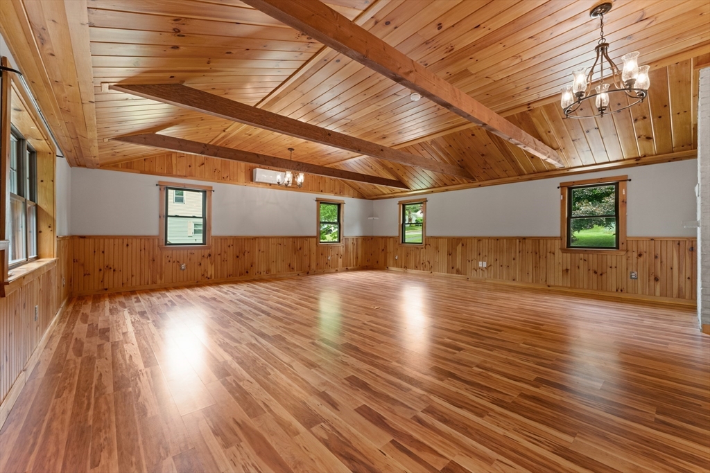 50 Farm Street Bellingham, MA 02019 - Photo 6 of 16 a view of a room with wooden floors
