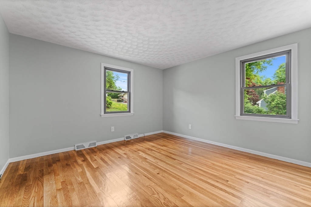 50 Farm Street Bellingham, MA 02019 - Photo 8 of 16 a view of empty room with window
