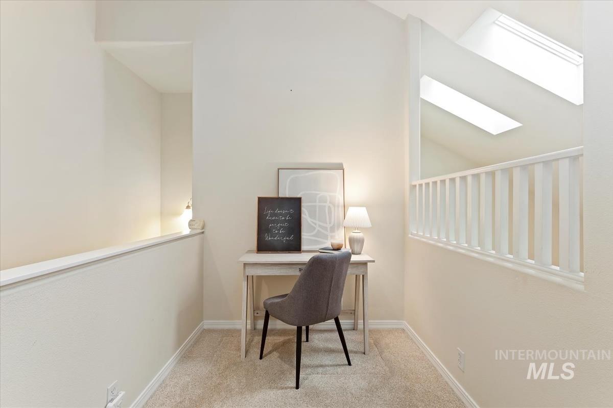 812 East Riverpark Lane Boise, ID 83706 - Photo 12 of 24 Office with light colored carpet and a skylight