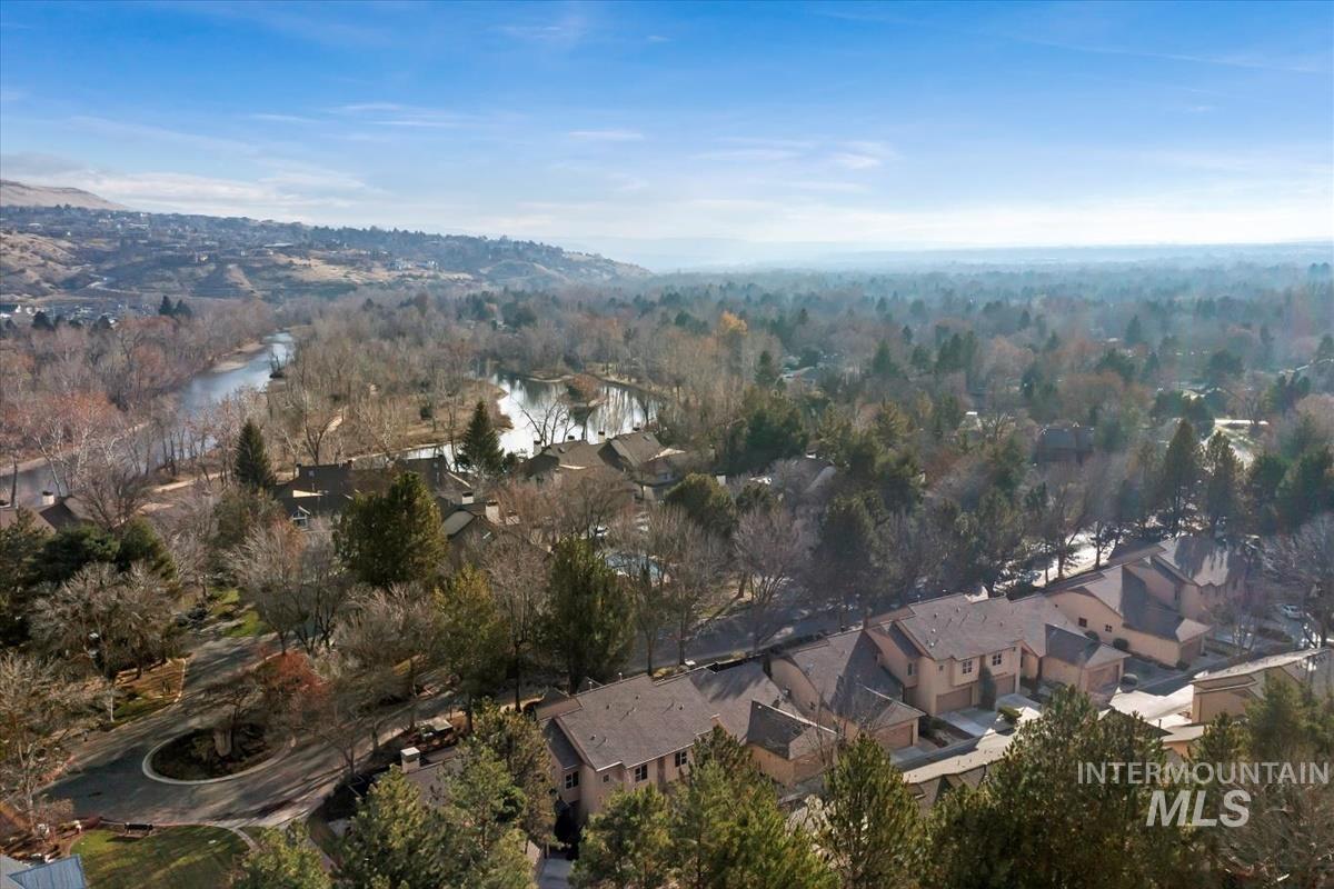 812 East Riverpark Lane Boise, ID 83706 - Photo 21 of 24 Aerial view of property and surrounding area with a heavily wooded area