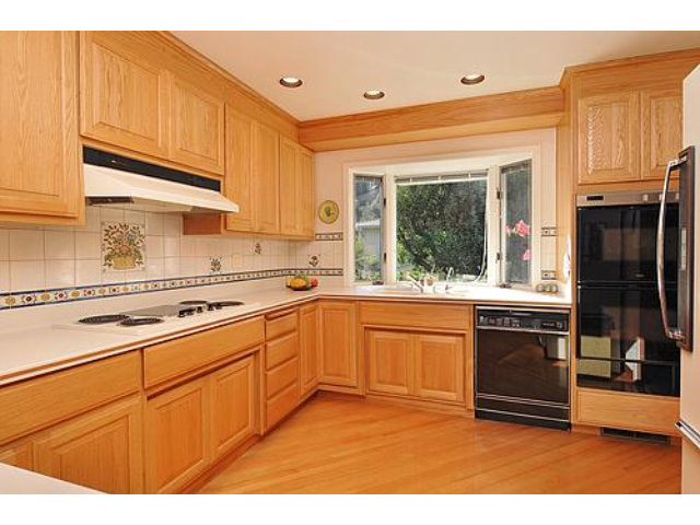 2726 El Prado Road Burlingame, CA 94010 - Photo 3 of 11 a kitchen with granite countertop a stove a sink and a refrigerator