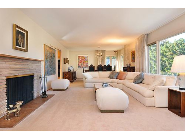 2726 El Prado Road Burlingame, CA 94010 - Photo 6 of 11 a living room with furniture large window and a fireplace