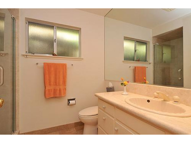 2726 El Prado Road Burlingame, CA 94010 - Photo 8 of 11 a bathroom with a sink and a mirror