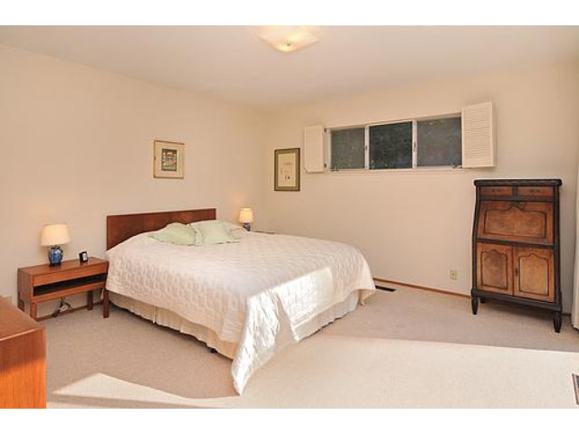 2726 El Prado Road Burlingame, CA 94010 - Photo 9 of 11 a bedroom with a bed and dresser