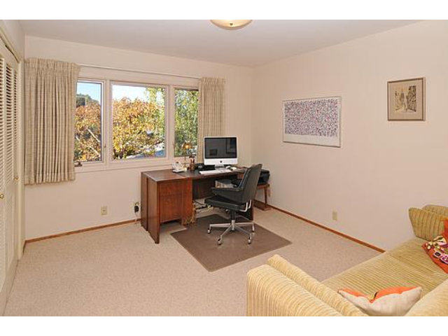 2726 El Prado Road Burlingame, CA 94010 - Photo 10 of 11 a view of a workspace with furniture and a window