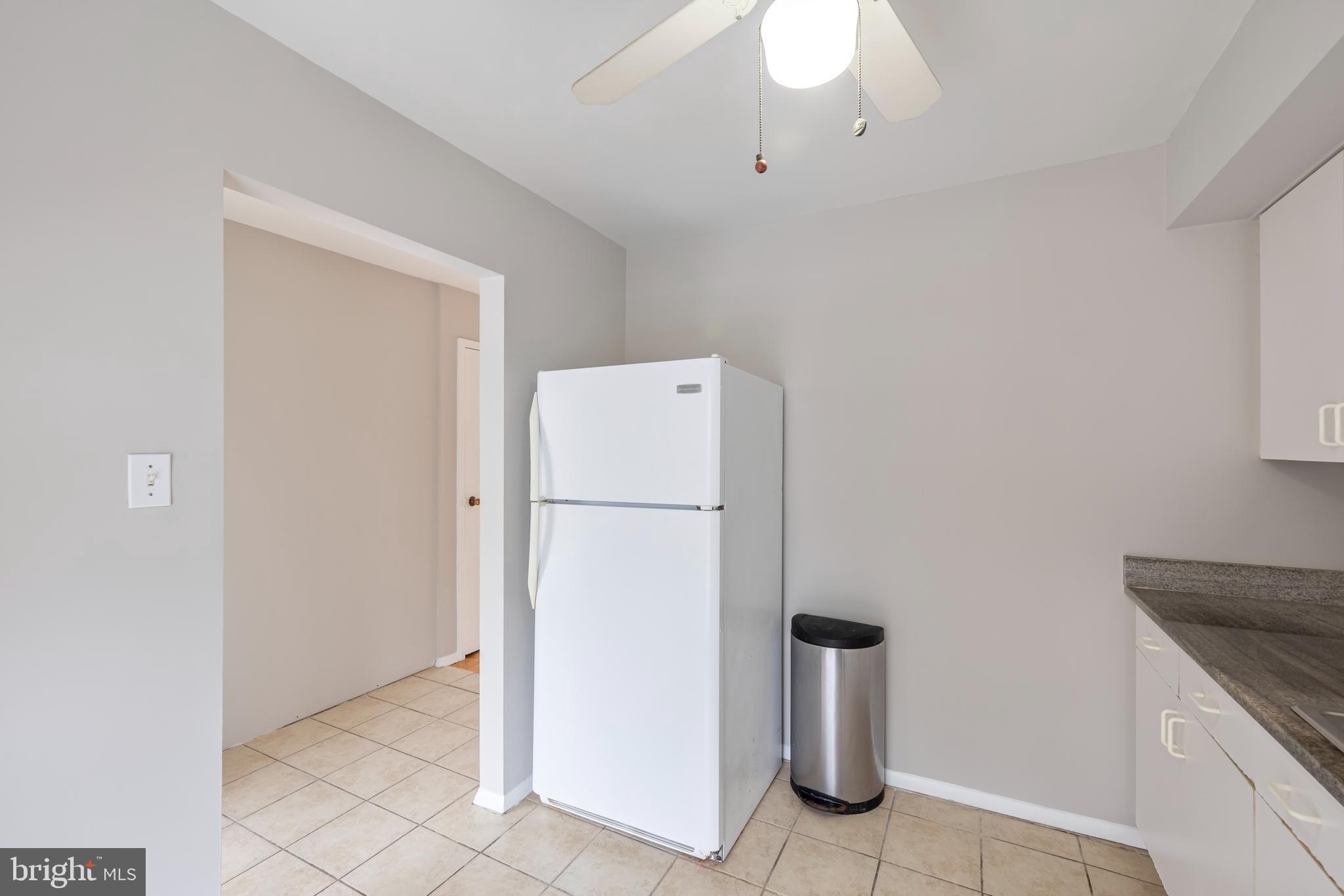 3902 Bel Pre Road, Unit 39028 Silver Spring, MD 20906 - Photo 11 of 31 a utility room with dryer and washer