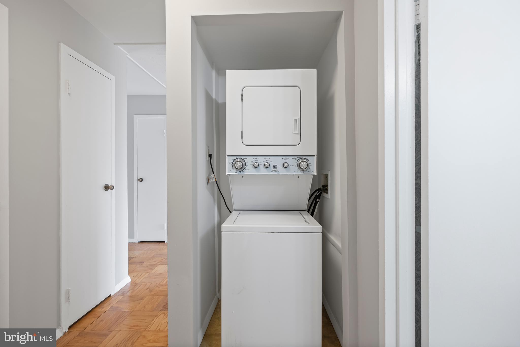 3902 Bel Pre Road, Unit 39028 Silver Spring, MD 20906 - Photo 27 of 31 a utility room with dryer and washer