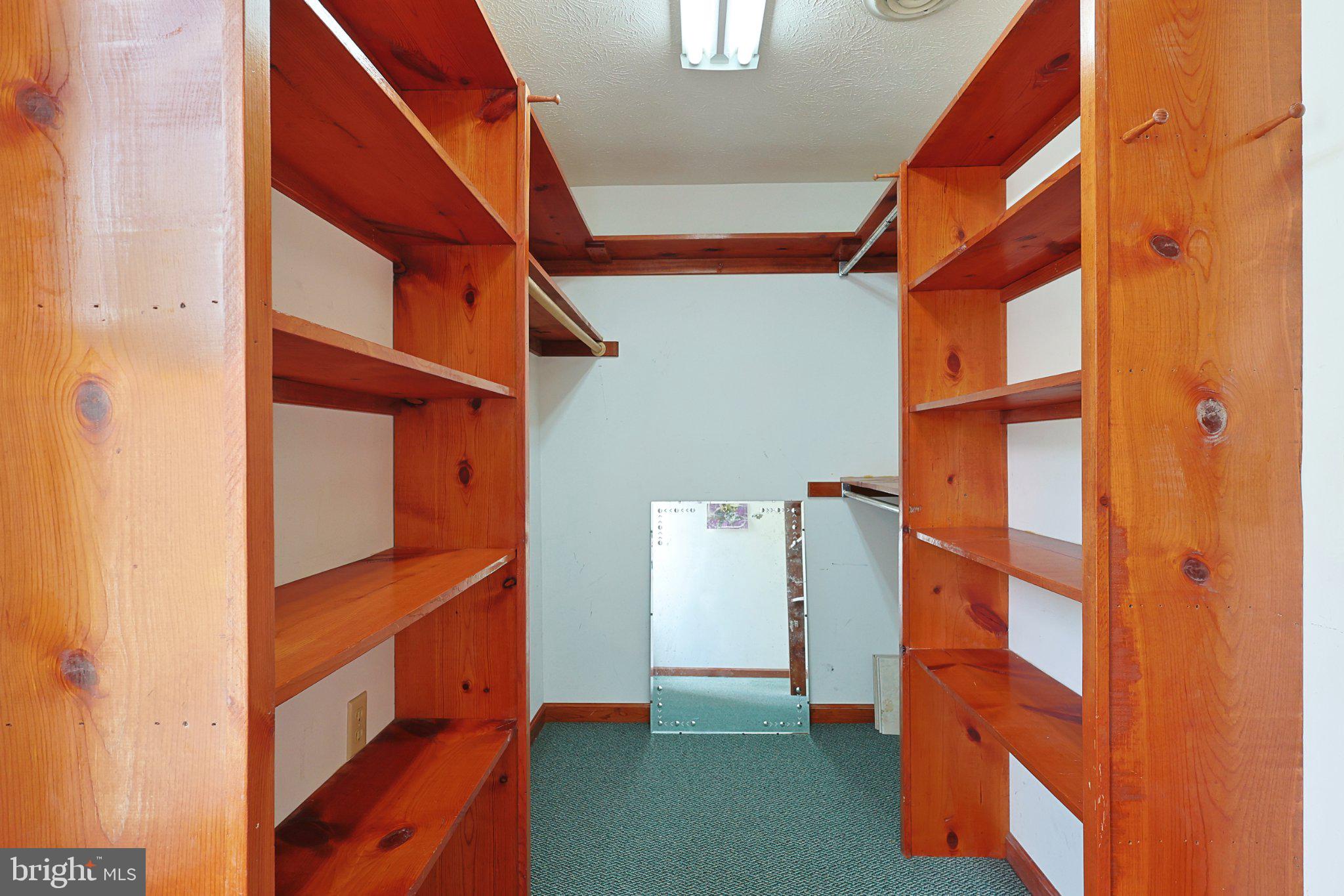 73 Silver Street Ridgeley, WV 26753 - Photo 28 of 36 Spacious wooden shelving for organization.