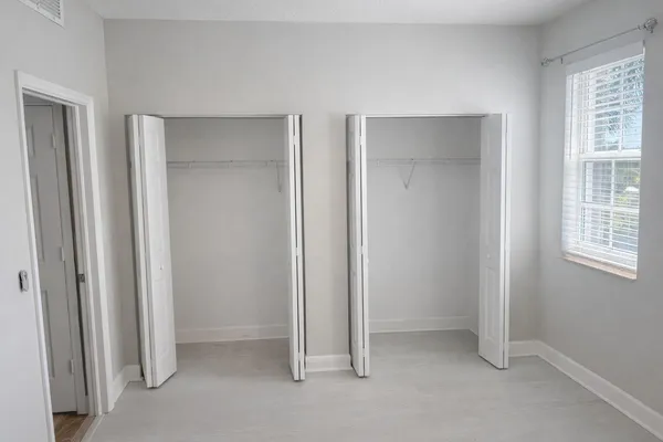 an empty room with windows