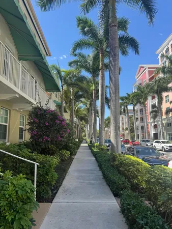 a view of a building with a yard