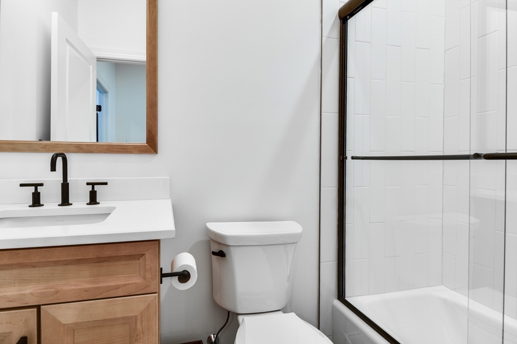 16 Barnes Boulevard, Unit 16 Hudson, MA 01749 - Photo 21 of 42 a bathroom with a sink toilet and shower
