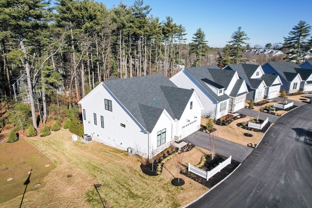 16 Barnes Boulevard, Unit 16 Hudson, MA 01749 - Photo 37 of 42 a view of a house with roof deck