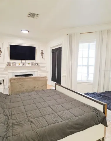 a view of a bathroom with a tub and shower