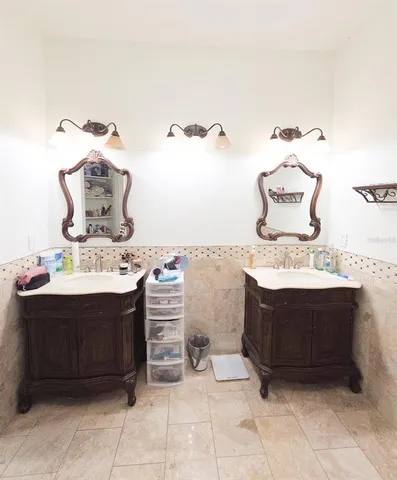 a large kitchen with stainless steel appliances kitchen island granite countertop a large counter top stainless steel appliances and cabinets