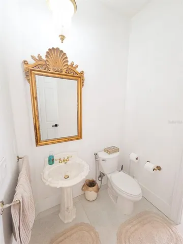 a kitchen with stainless steel appliances granite countertop a stove and a refrigerator