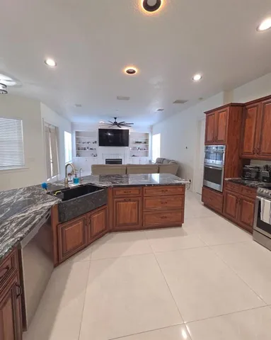 a living room with furniture and a window