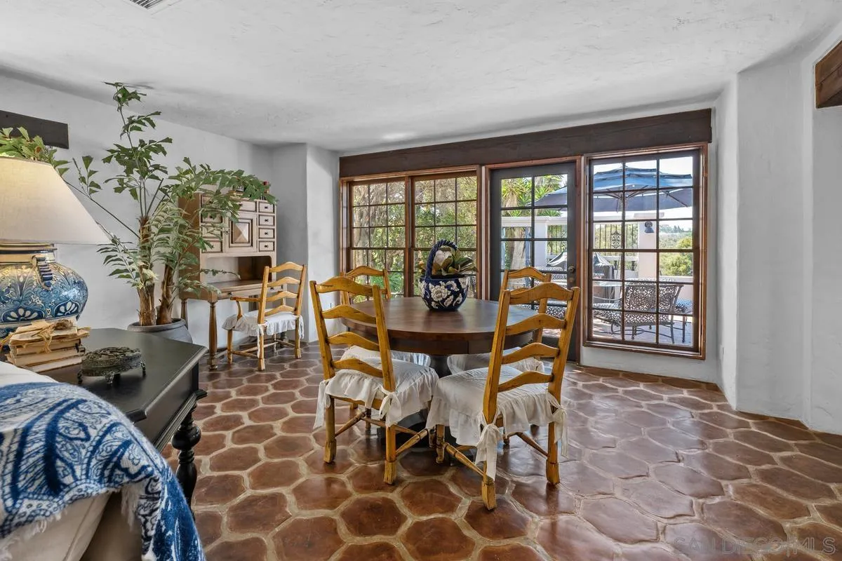 17507 Los Morros Rancho Santa Fe, CA 92067 - Photo 14 of 60 a view of a dining room with furniture window and outside view