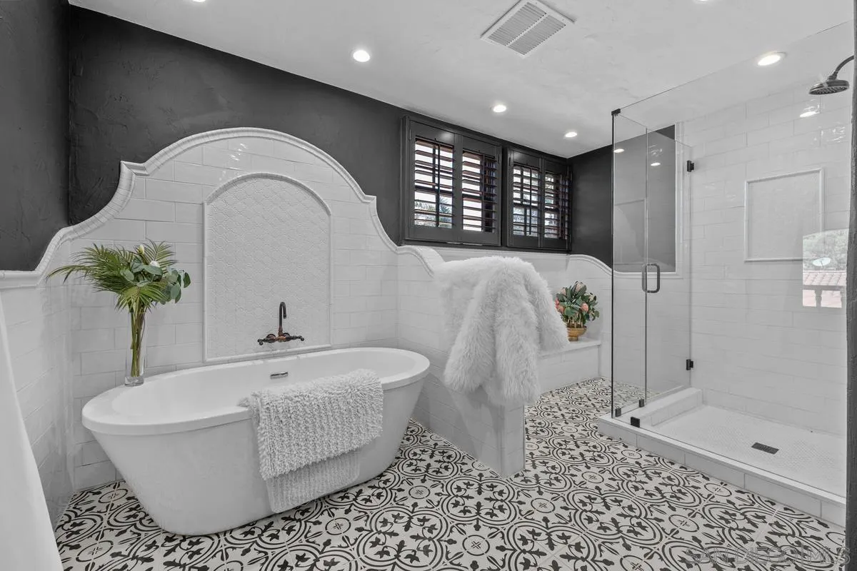 17507 Los Morros Rancho Santa Fe, CA 92067 - Photo 39 of 60 a bathroom with a bathtub and a shower