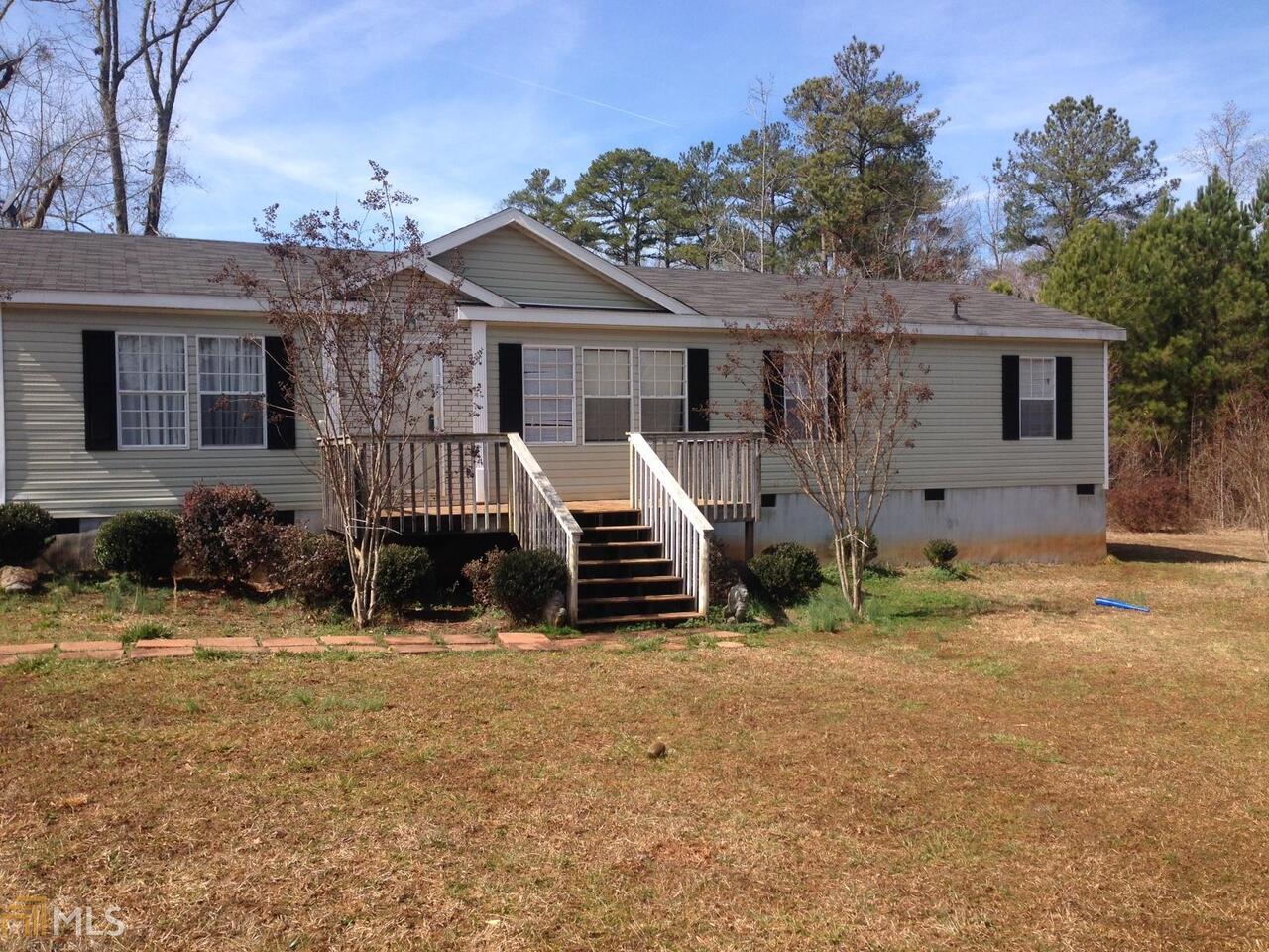 982 Boxankle Road, Unit 1 Forsyth, GA 31029 - Photo 1 of 1 a view of a house with a yard