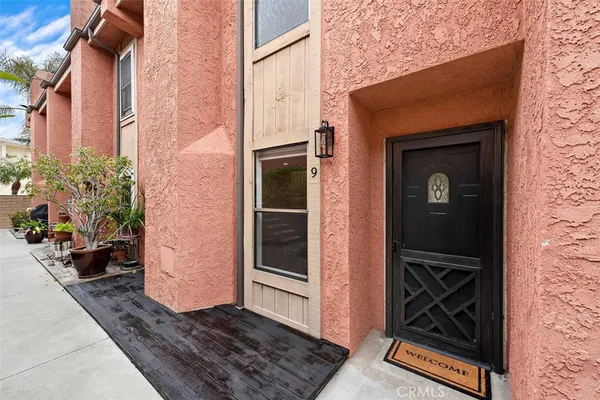 a view of a door and a window