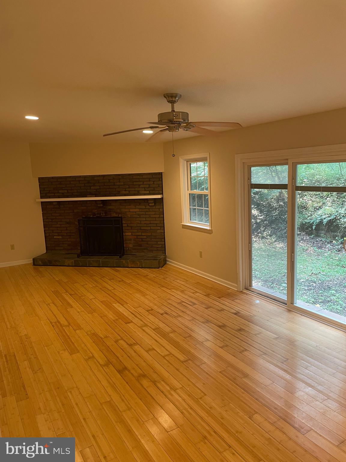 1300 Shadyside Road Downingtown, PA 19335 - Photo 6 of 17 a view of empty room with wooden floor and fan