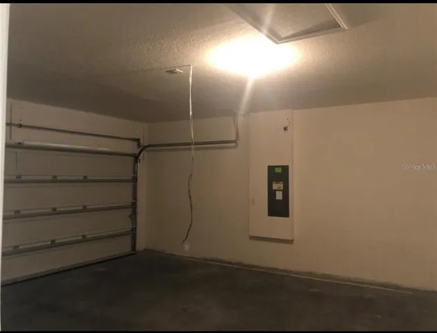 a room with closet and wooden floor