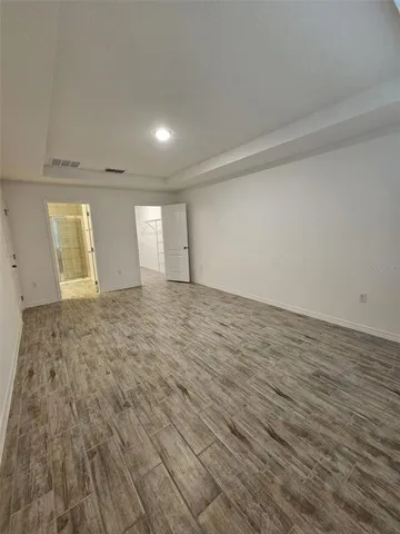 a view of an empty room and window