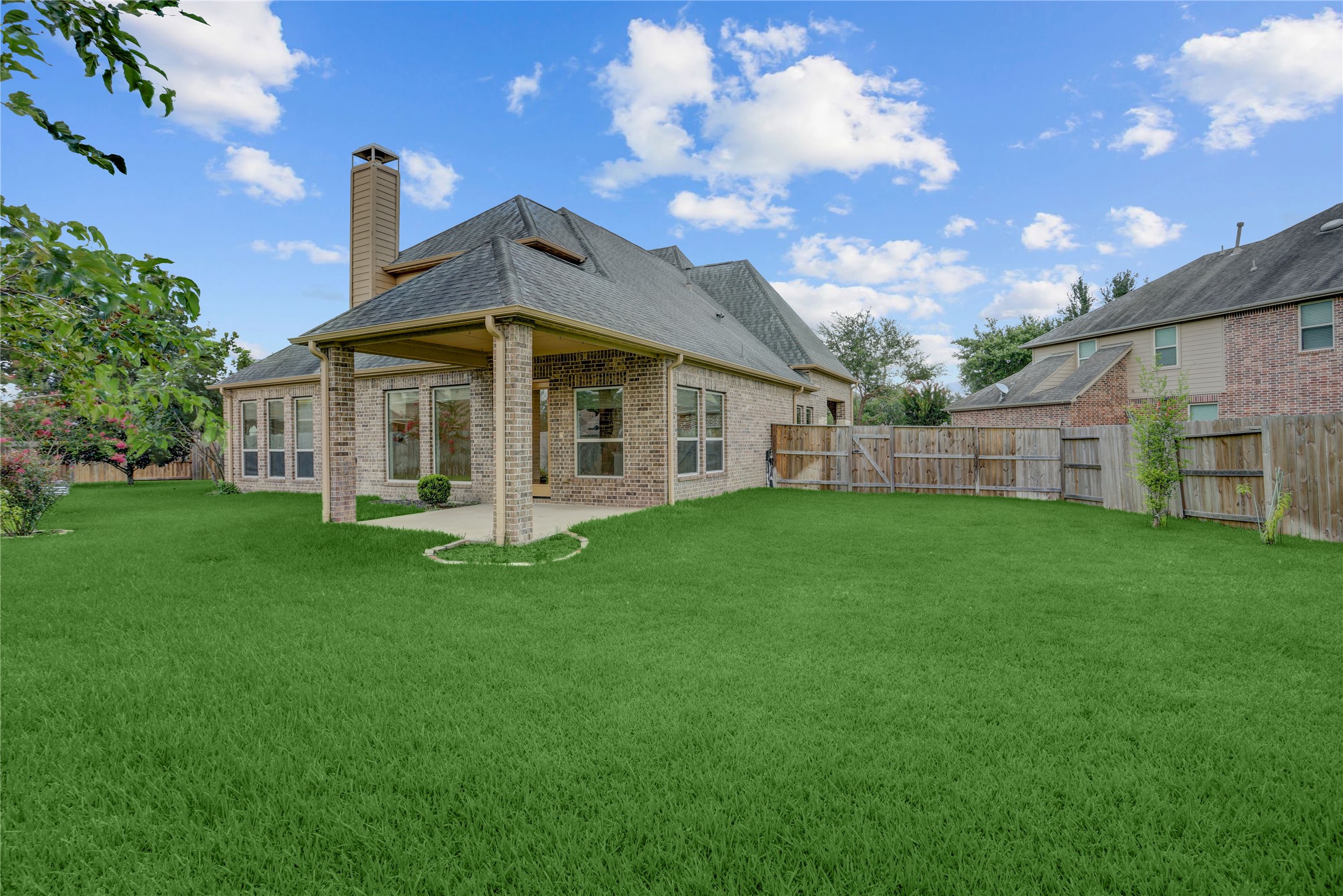 3002 Currant Drive Manvel, TX 77578 - Photo 35 of 43 a view of a house with a big yard and large trees
