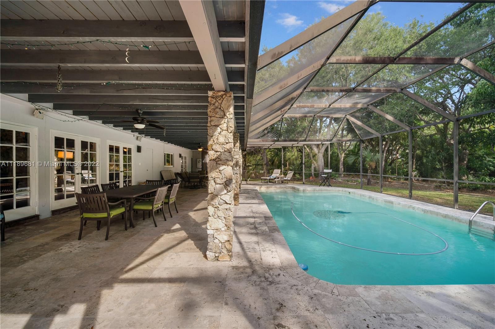 6465 Southwest 126th Street Road Pinecrest, FL 33156 - Photo 27 of 37 a view of yard with patio