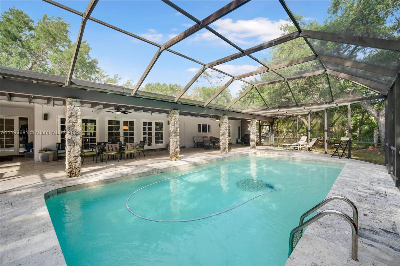 6465 Southwest 126th Street Road Pinecrest, FL 33156 - Photo 28 of 37 a view of a house with backyard