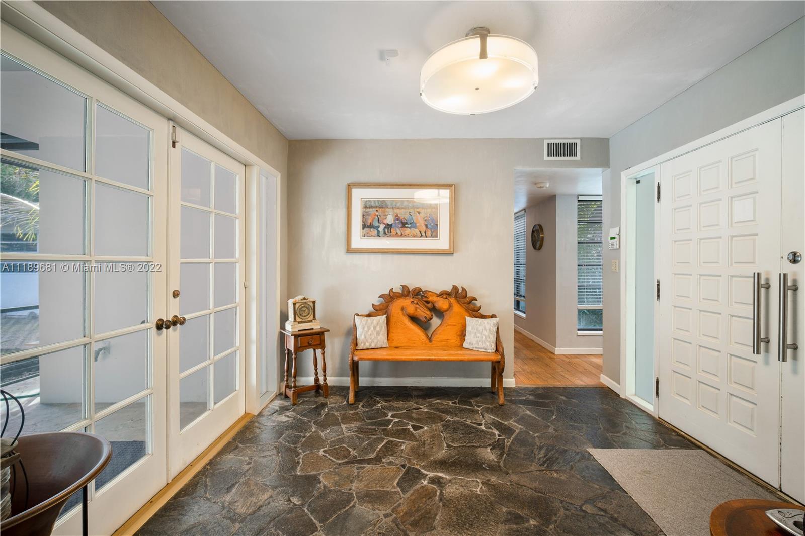 6465 Southwest 126th Street Road Pinecrest, FL 33156 - Photo 34 of 37 a view of an entryway with workspace