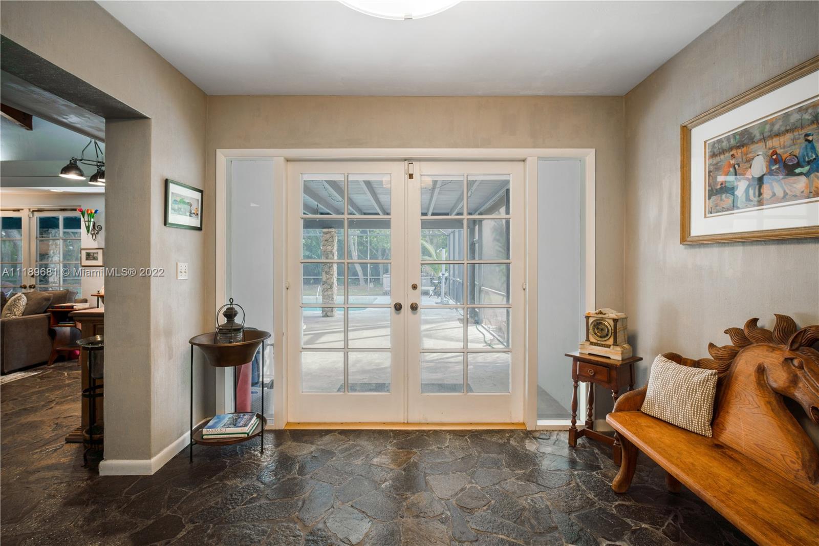 6465 Southwest 126th Street Road Pinecrest, FL 33156 - Photo 37 of 37 a view of workspace with lounge chair