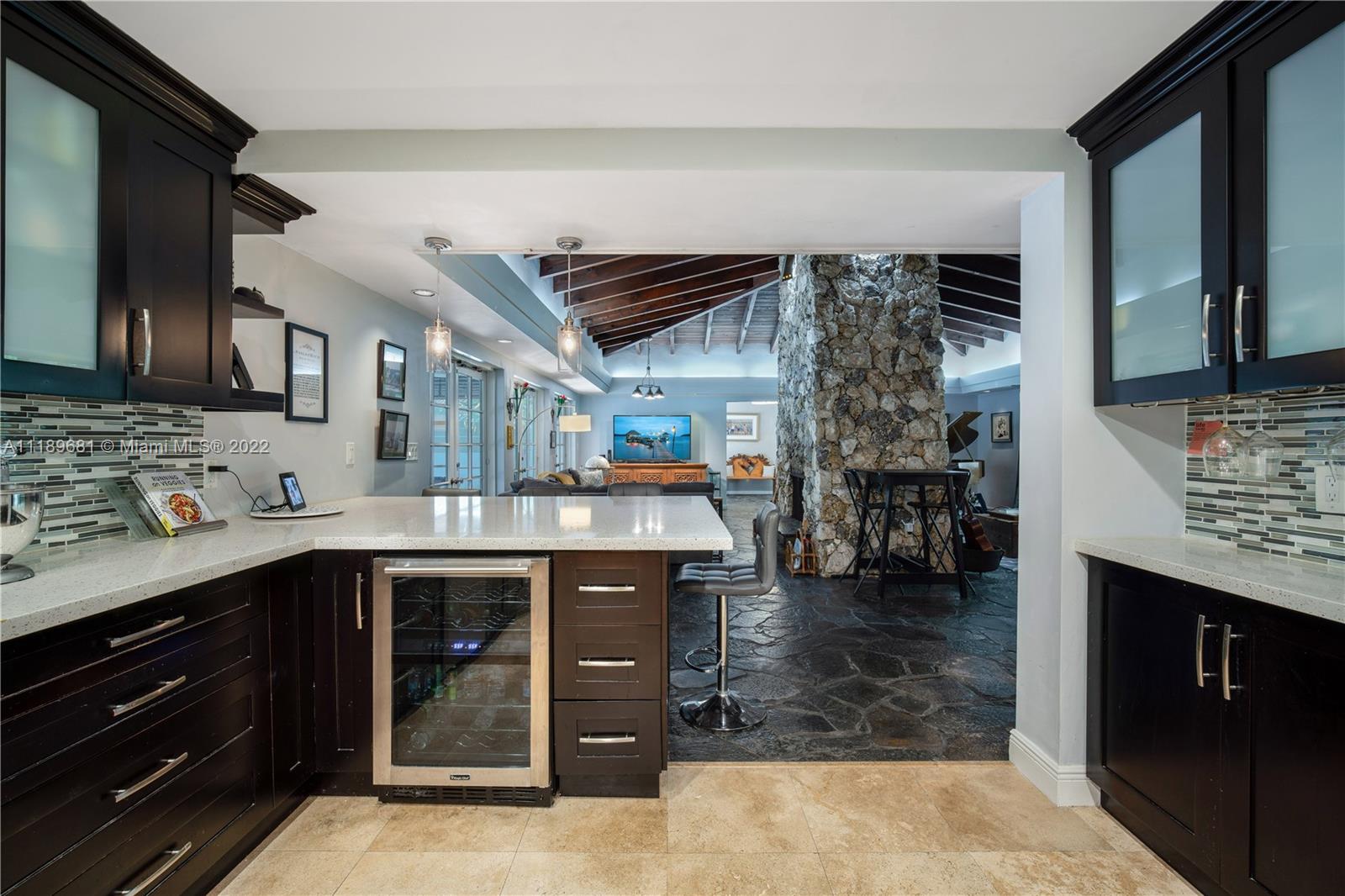 6465 Southwest 126th Street Road Pinecrest, FL 33156 - Photo 4 of 37 a kitchen with a sink and cabinets
