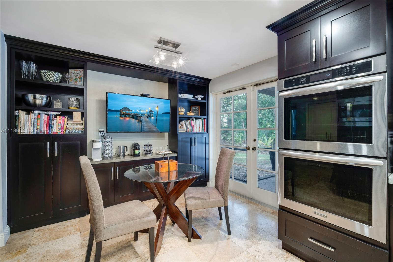 6465 Southwest 126th Street Road Pinecrest, FL 33156 - Photo 5 of 37 a dining room with furniture and window