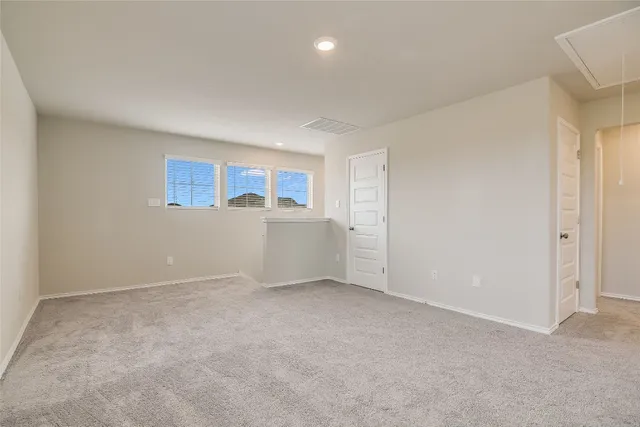 a view of an empty room with window