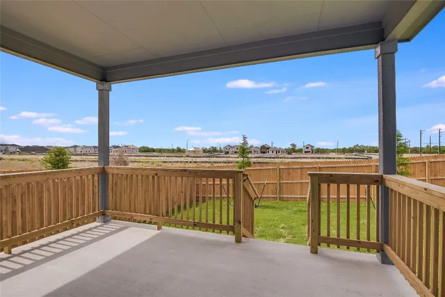 a view of a balcony with city view