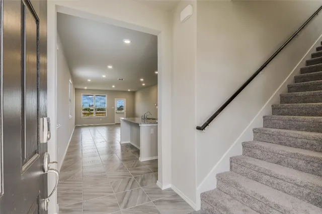 a view of gallery with wooden floor