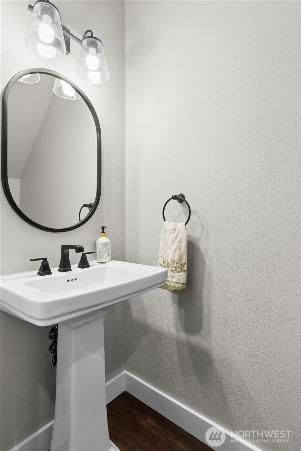 20012 27th Drive Southeast Bothell, WA 98012 - Photo 18 of 39 a bathroom with a sink and mirror