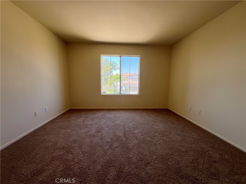 16200 Setting Sun Circle Riverside, CA 92503 - Photo 11 of 20 an empty room with a window