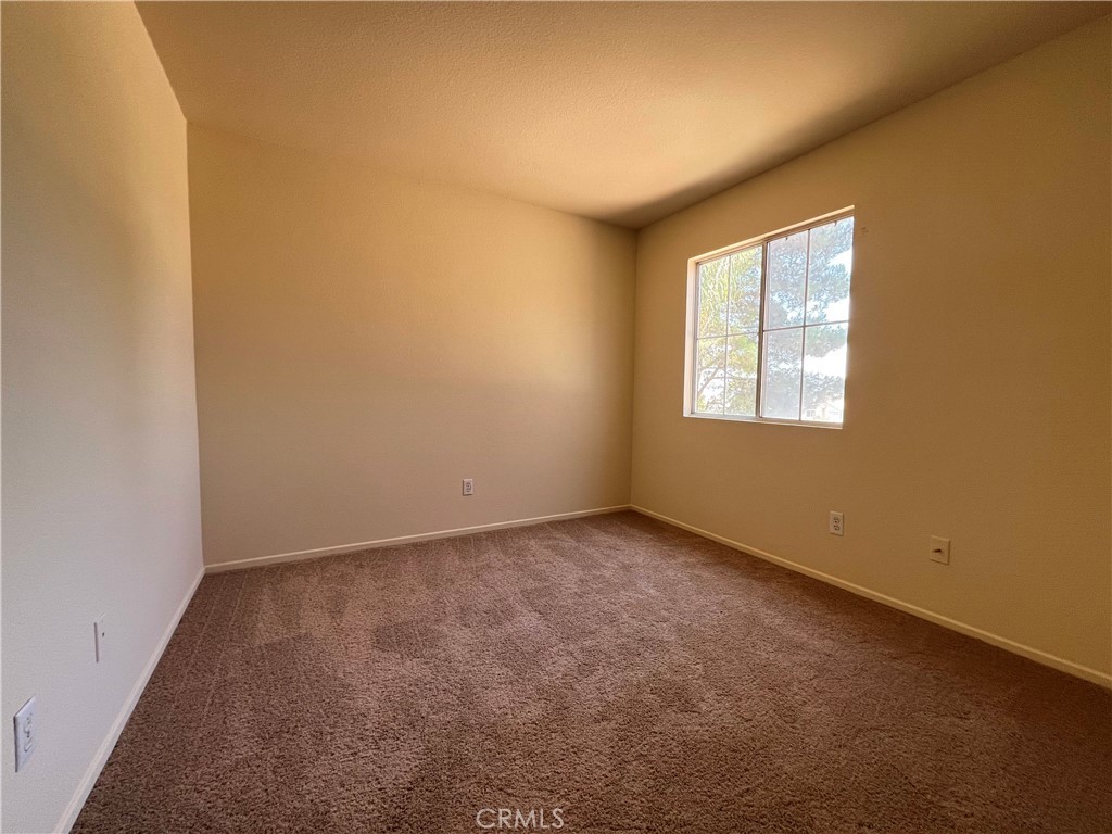 16200 Setting Sun Circle Riverside, CA 92503 - Photo 13 of 20 an empty room with windows