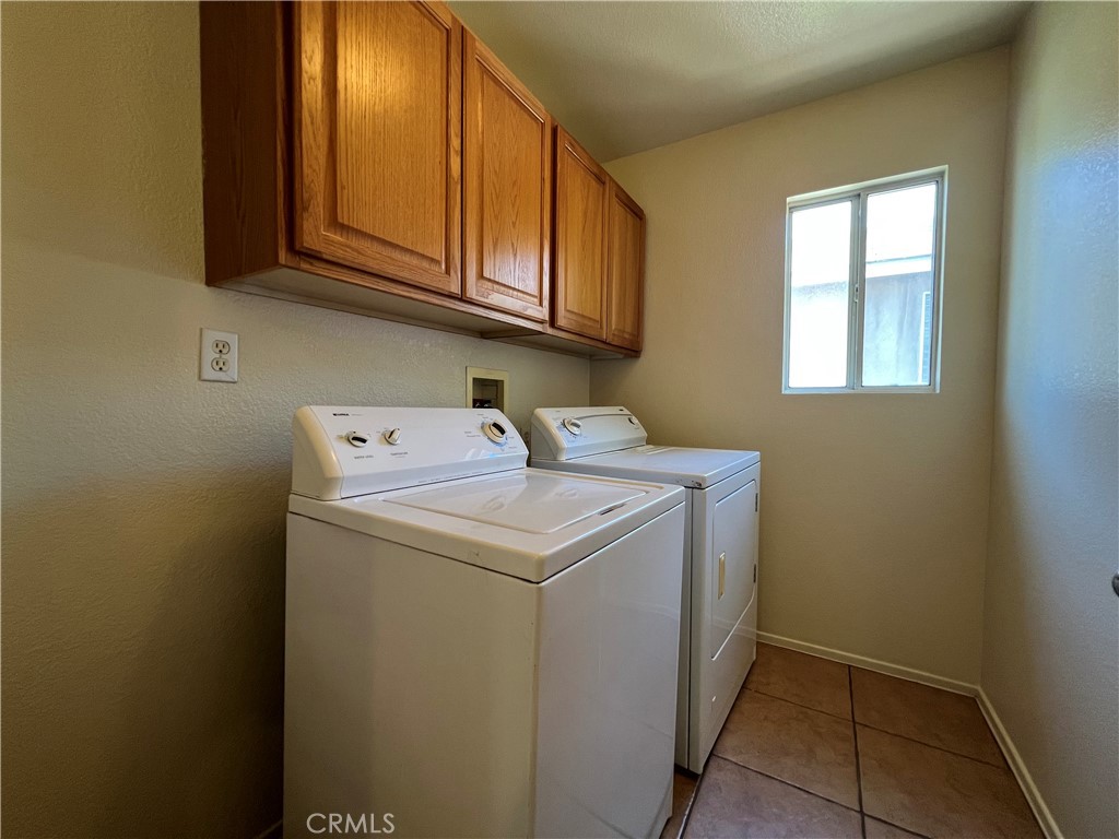 16200 Setting Sun Circle Riverside, CA 92503 - Photo 16 of 20 a utility room with dryer and washer