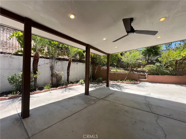a outdoor space with sliding door and garden view