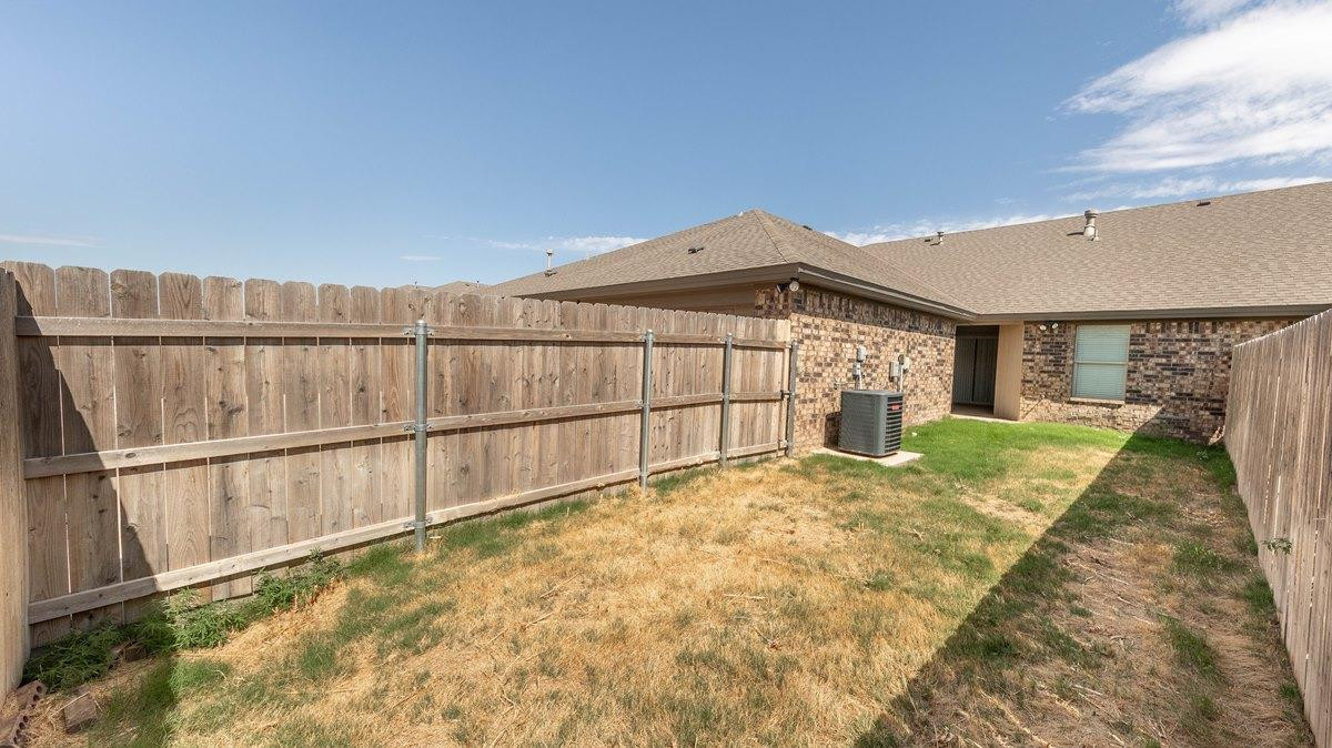 2545 137th Street Lubbock, TX 79423 - Photo 21 of 26 a view of a backyard