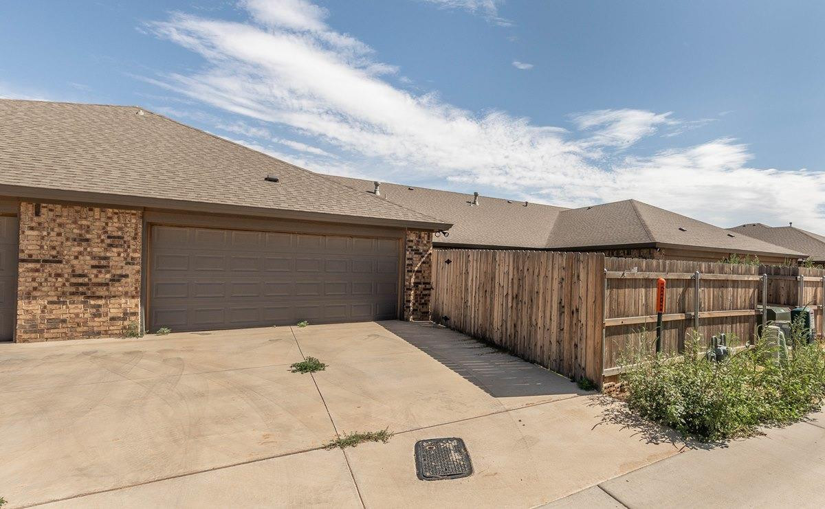 2545 137th Street Lubbock, TX 79423 - Photo 22 of 26 a backyard of a house