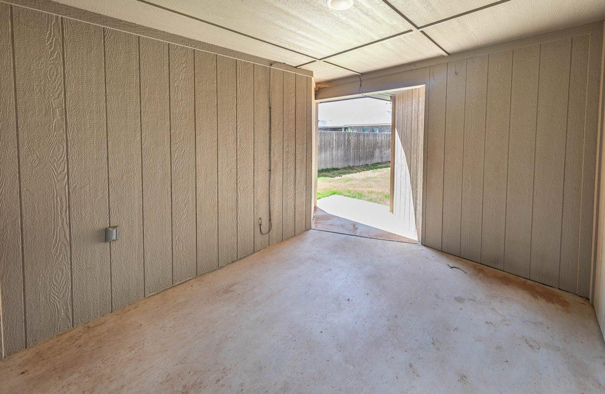 2545 137th Street Lubbock, TX 79423 - Photo 24 of 26 a view of a room with an empty space and a window