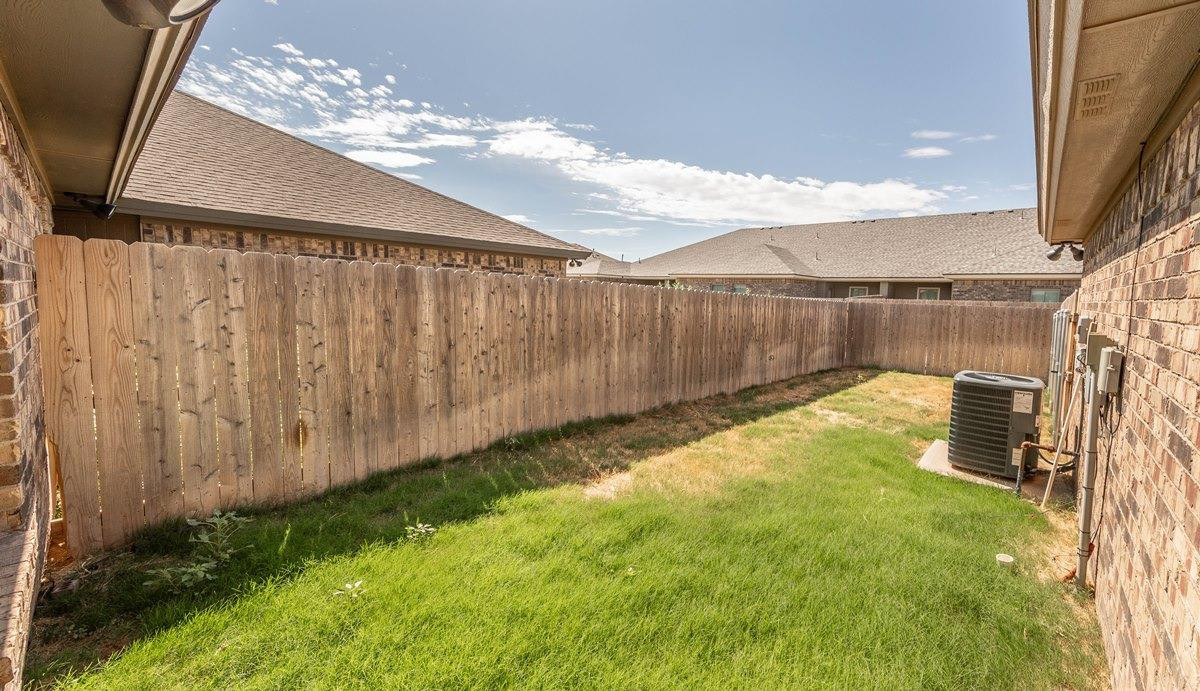 2545 137th Street Lubbock, TX 79423 - Photo 26 of 26 a view of a backyard with tub