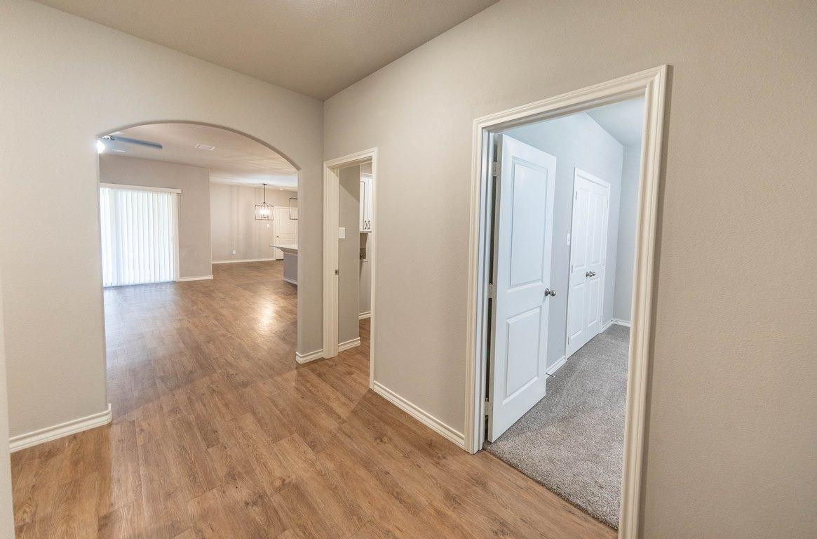 2545 137th Street Lubbock, TX 79423 - Photo 4 of 26 a view of a room with wooden floor