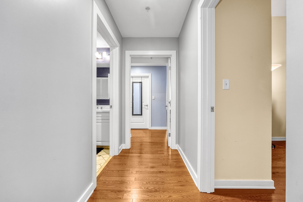 2 Rollins Street, Unit D603 Boston, MA 02118 - Photo 11 of 20 a view of a hallway with wooden floor