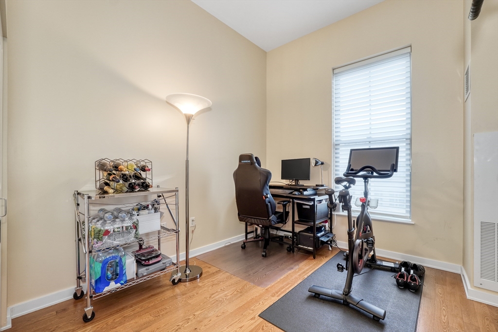 2 Rollins Street, Unit D603 Boston, MA 02118 - Photo 12 of 20 a view of a workspace with gym equipment